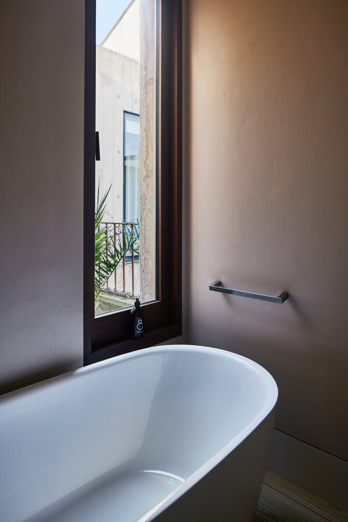 A Modern House Centered Around a Courtyard 21 freestanding-bath