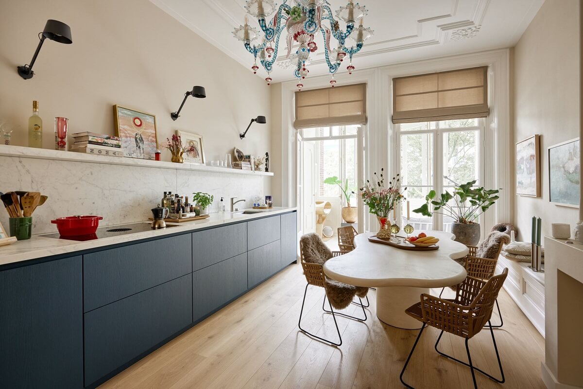 kitchen-blue-cabinets-wavy-dining-table-nordroom