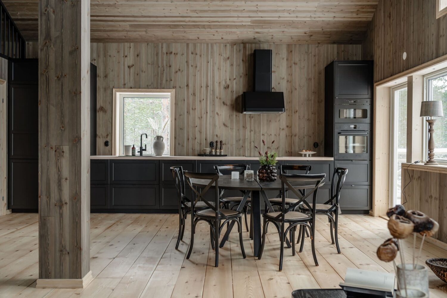 A Cozy Log House in Sweden 9 kitchen-dining-space-open-plan-living-space-nordroom
