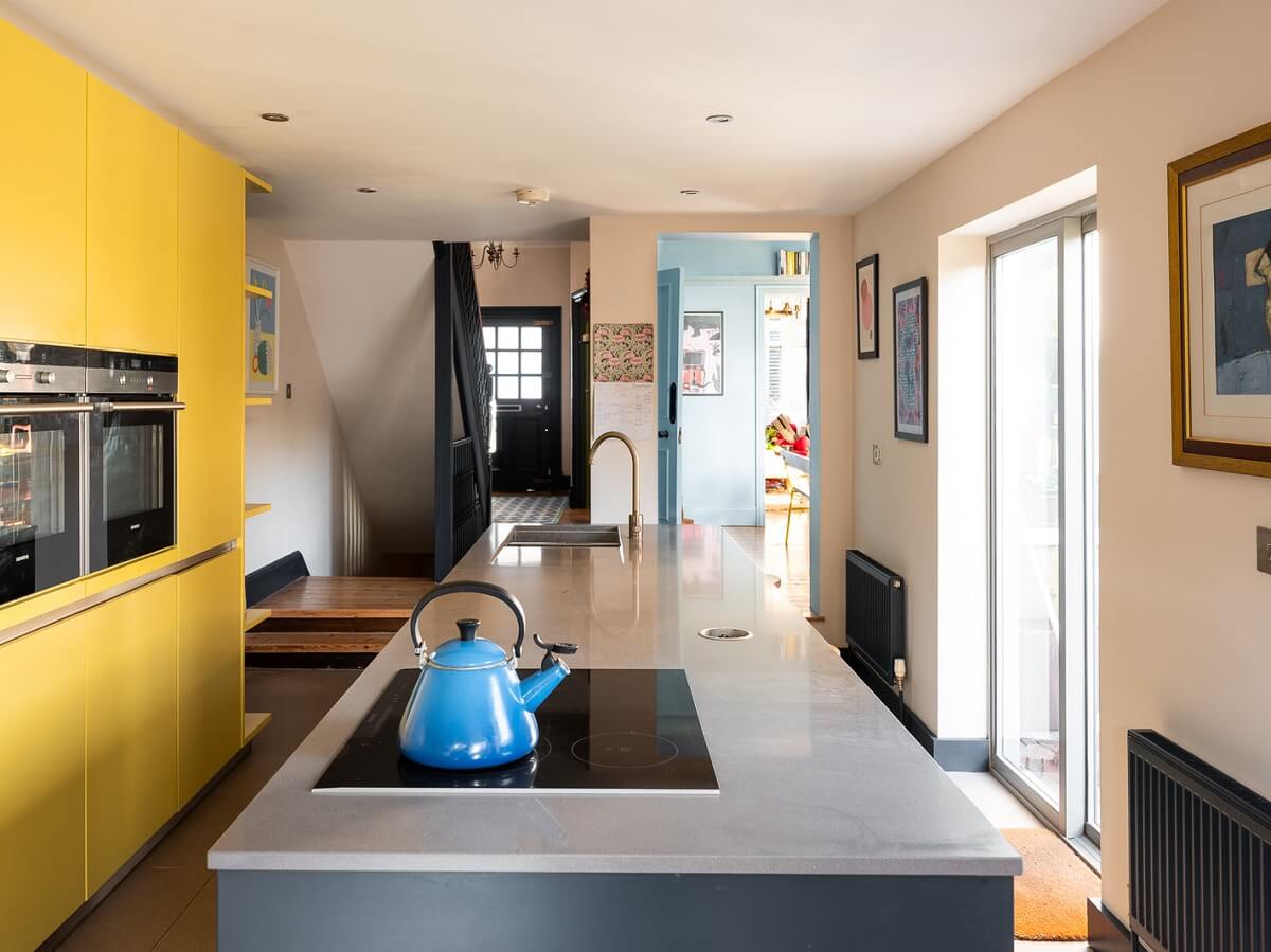 Playful Colors in a Historic Home in Kent 7 kitchen-with-yellow-floor-to-ceiling-cabinets-nordroom