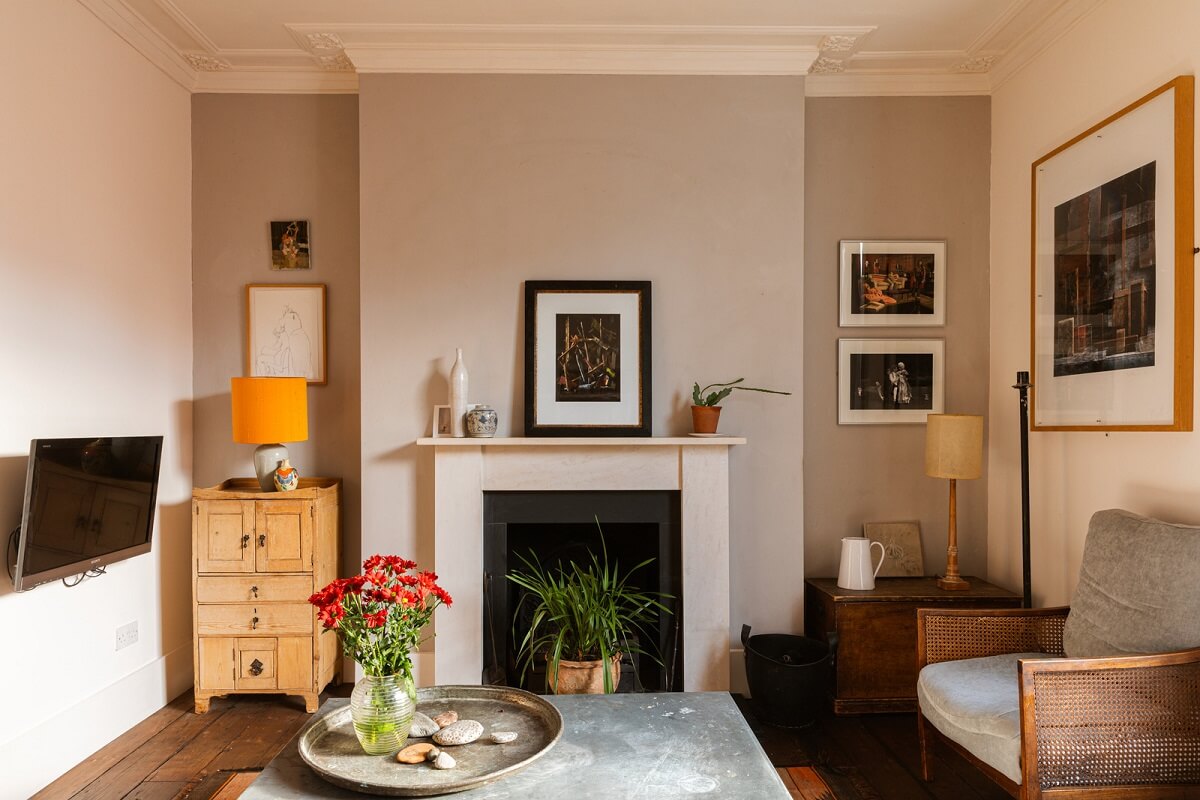 Cozy Cottage Style in a London House with a Garden 5 light-gray-accent-wall-living-room-fireplace-nordroom