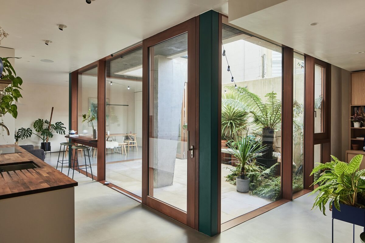 A Modern House Centered Around a Courtyard 6 living-spaces-around-courtyard-garden-nordroom