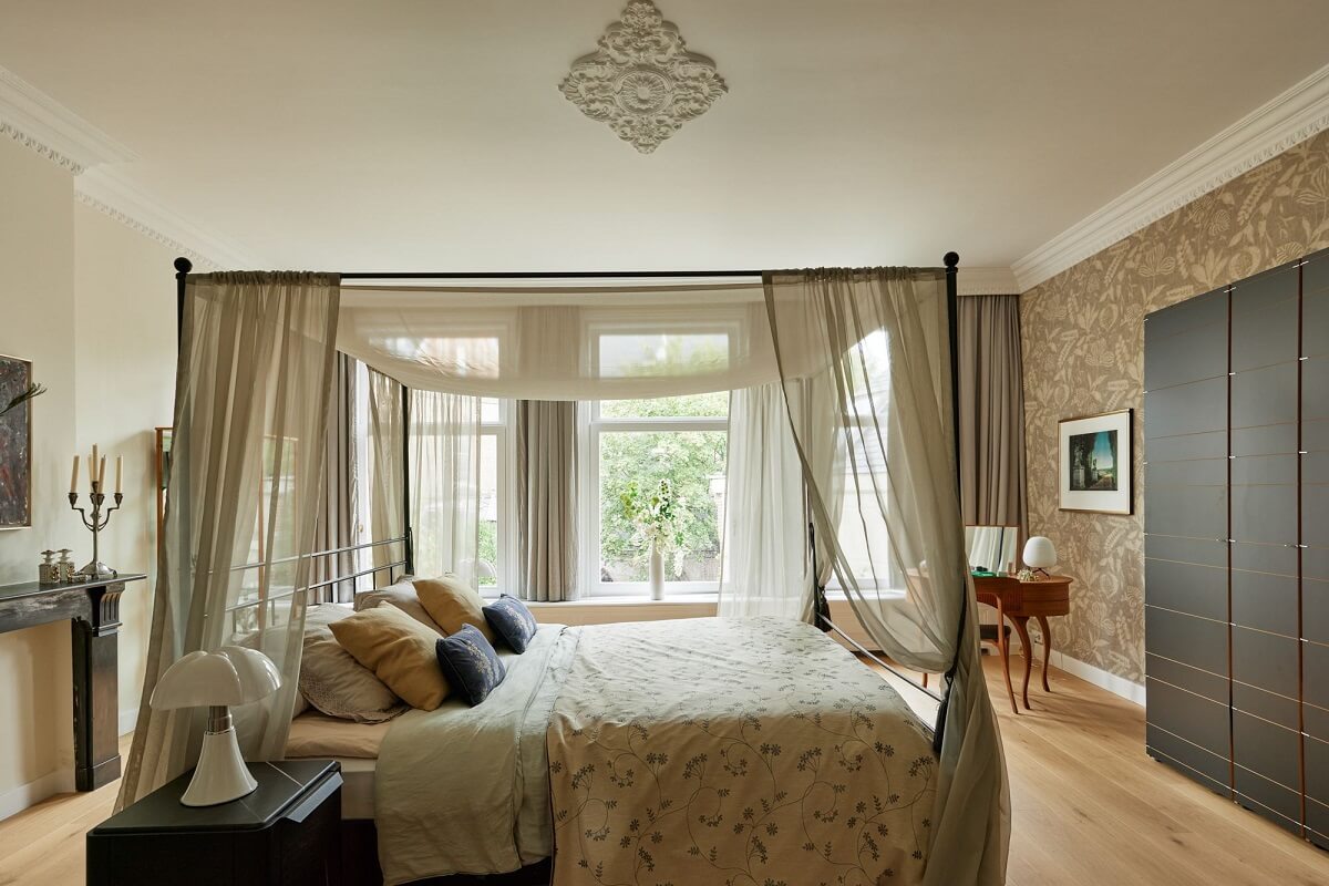 A Light Historic House in Amsterdam 11 master-bedroom-canopy-bed-nordroom