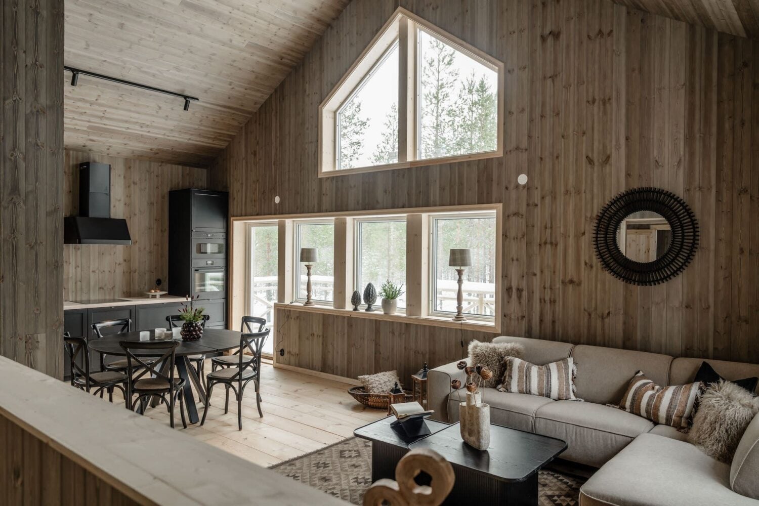 A Cozy Log House in Sweden 8 open-plan-log-home-living-space-scandinavian-style-nordroom
