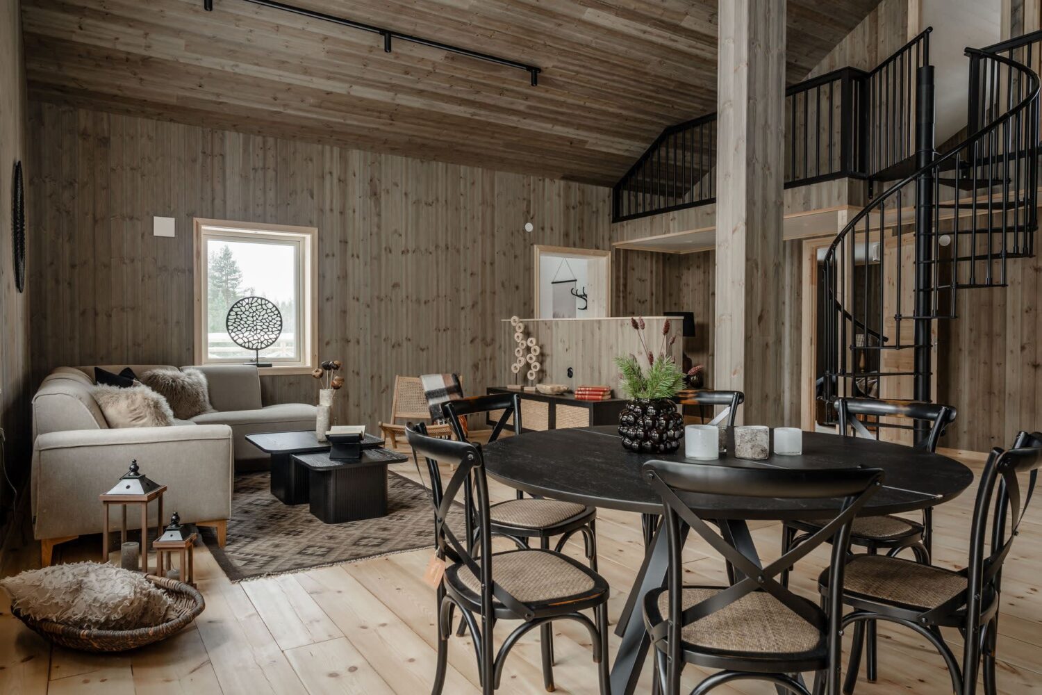 A Cozy Log House in Sweden 6 open-plan-log-house-living-space-pitched-ceiling-nordroom