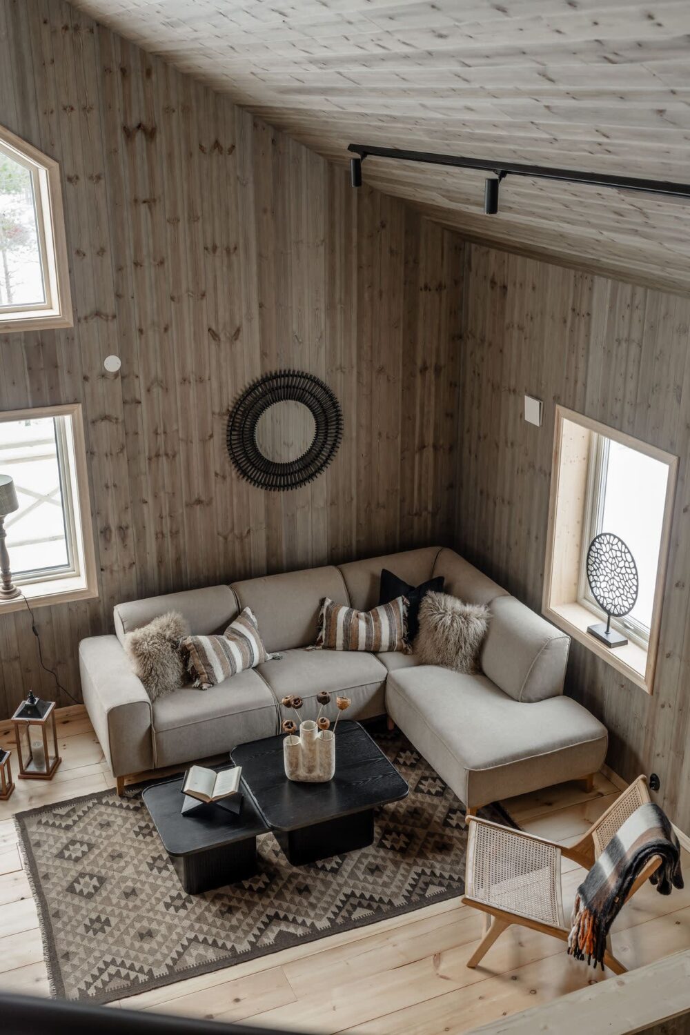 A Cozy Log House in Sweden 7 scandinavian-living-room-log-house-pitched-ceiling-nordroom
