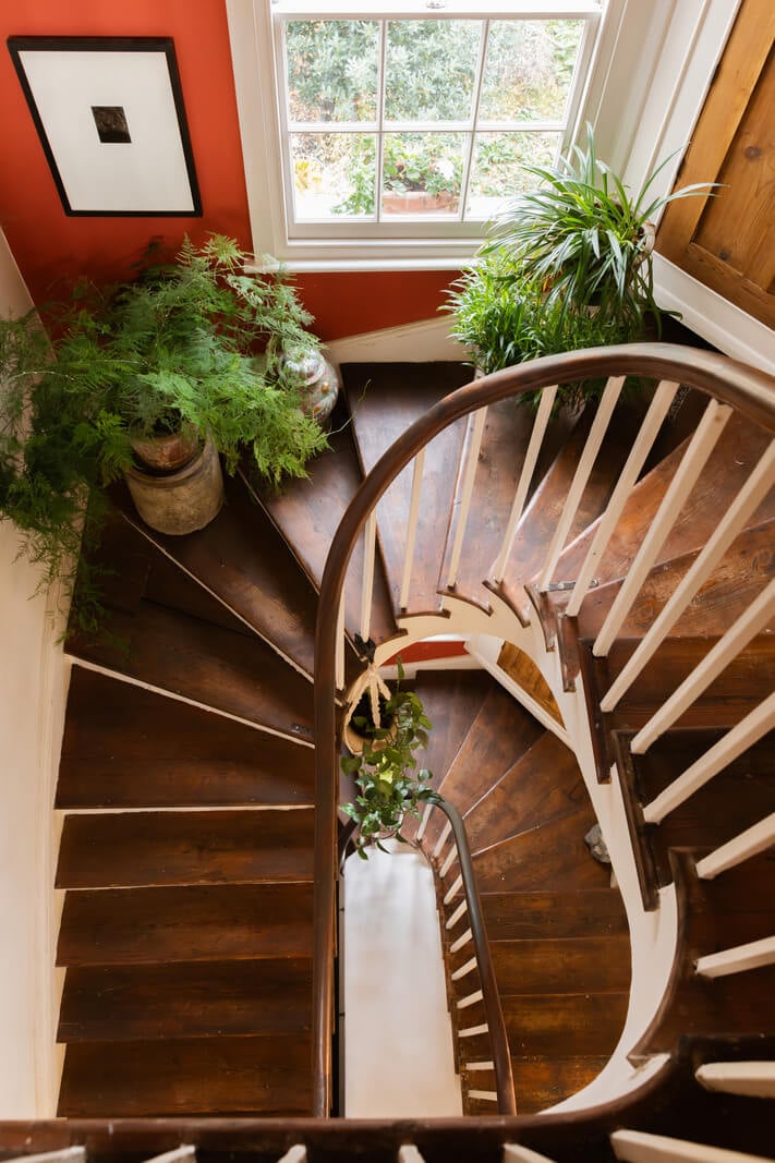Cozy Cottage Style in a London House with a Garden 12 spiral-wooden-staircase-from-above-nordroom