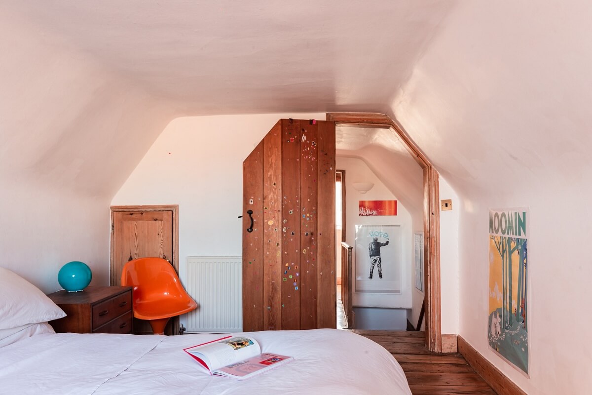Rustic Wooden Elements in a Historic English House 16 white attic bedroom wooden door