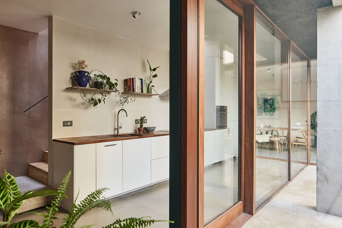 A Modern House Centered Around a Courtyard 2 white-kitchen-shelf