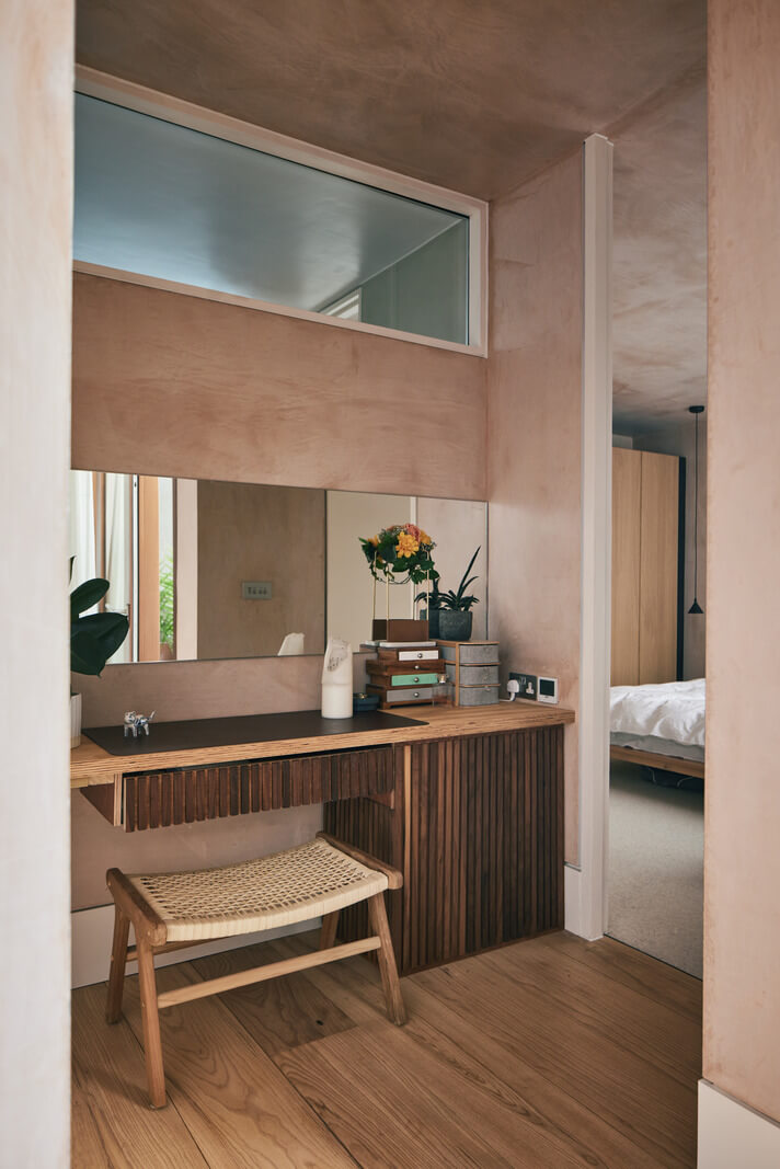 A Modern House Centered Around a Courtyard 16 wooden-desk-nordroom