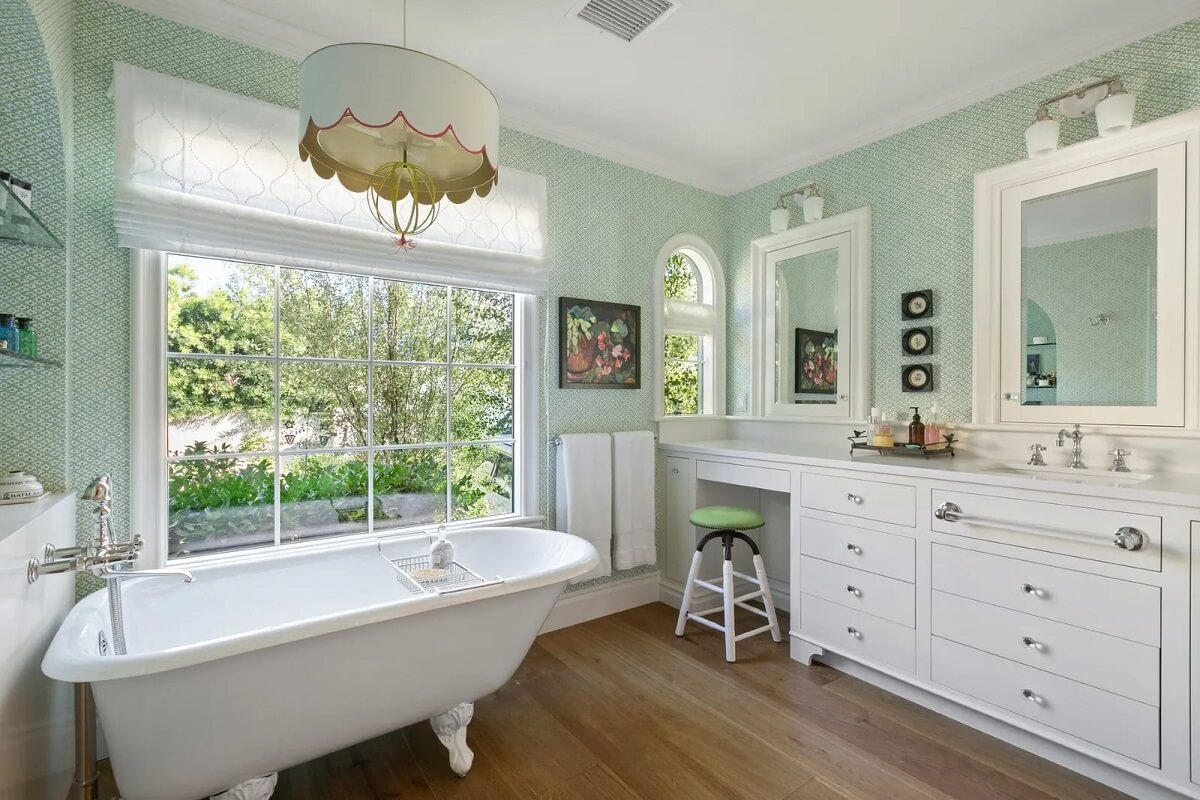 Emma Stone's Colorful Spanish-Style Los Angeles Home is For Sale 14 bathroom-green-wallpaper-freestanding-bath-vanity-table-nordroom