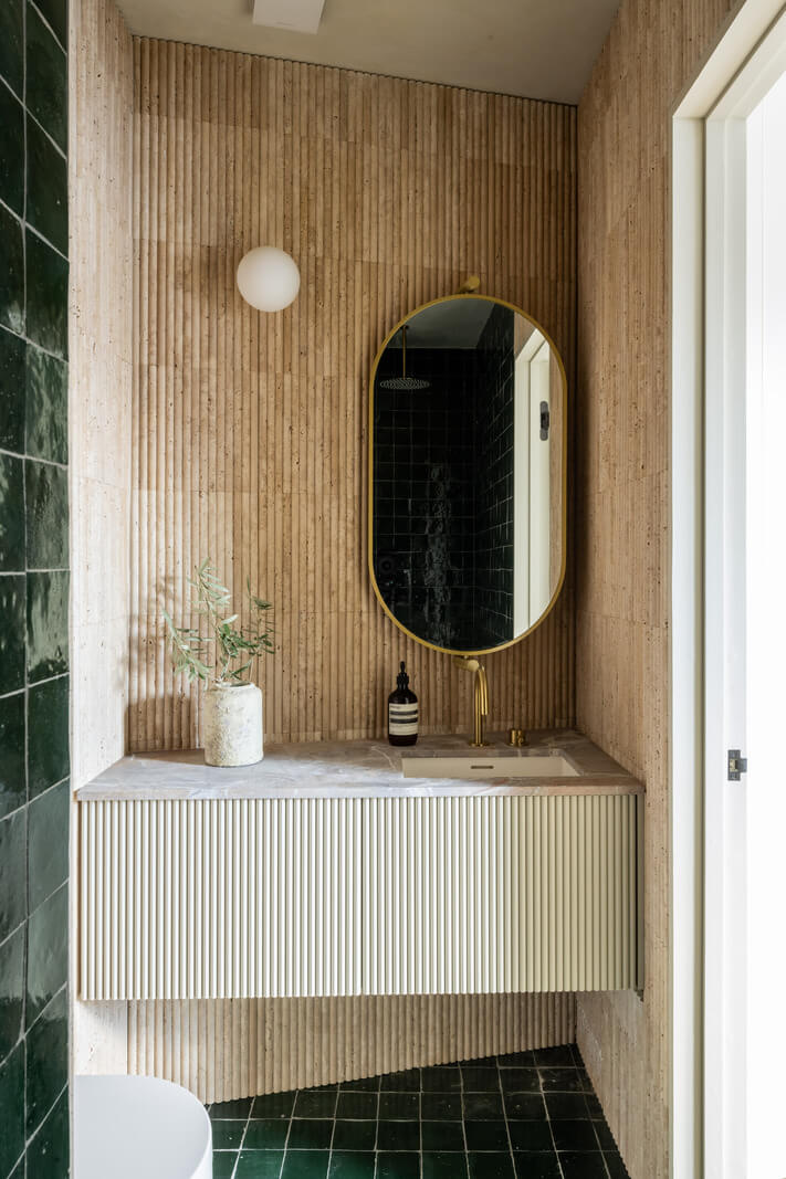 A Renovated Victorian House with Oak Features 15 bathroom with ribbed vanity and green tiles nordroom