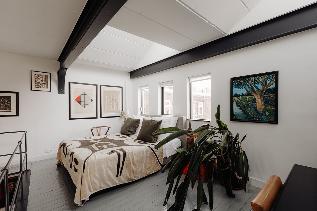 An Industrial Loft Apartment in Amsterdam 14 bedroom-black-steel-beams