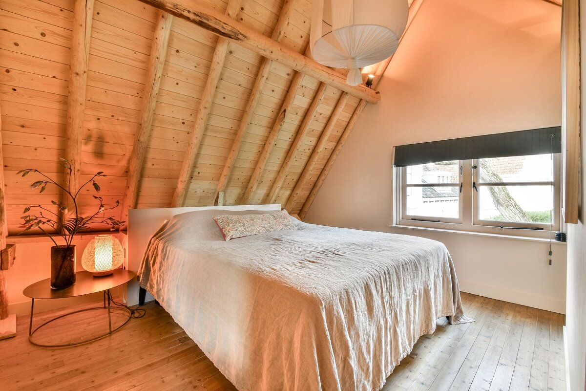 Wooden Interiors in a Historic Dutch Family Home 17 bedroom-slanted-wooden-ceiling-nordroom