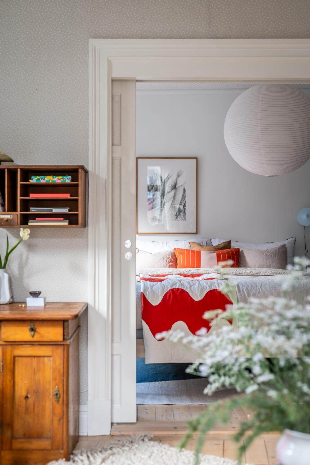 Primary Color Accents in a Light Swedish Apartment 10 bedroom-view