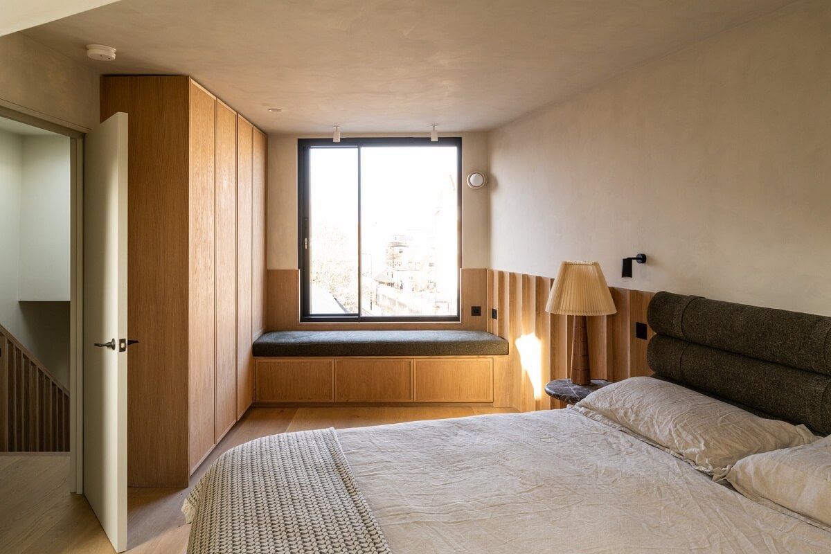 A Renovated Victorian House with Oak Features 18 bedroom with built in wardrobes and wooden window seat nodrroom