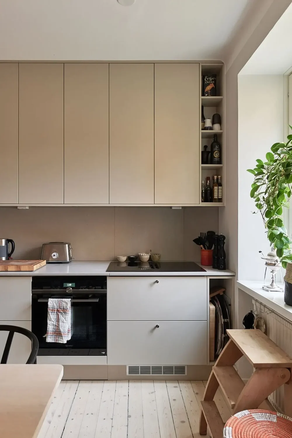 An Art-Filled Scandinavian Apartment 11 beige-kitchen