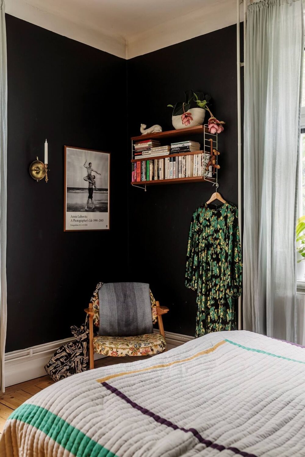A Swedish Apartment with a Yellow Living Room 8 black walls bedroom