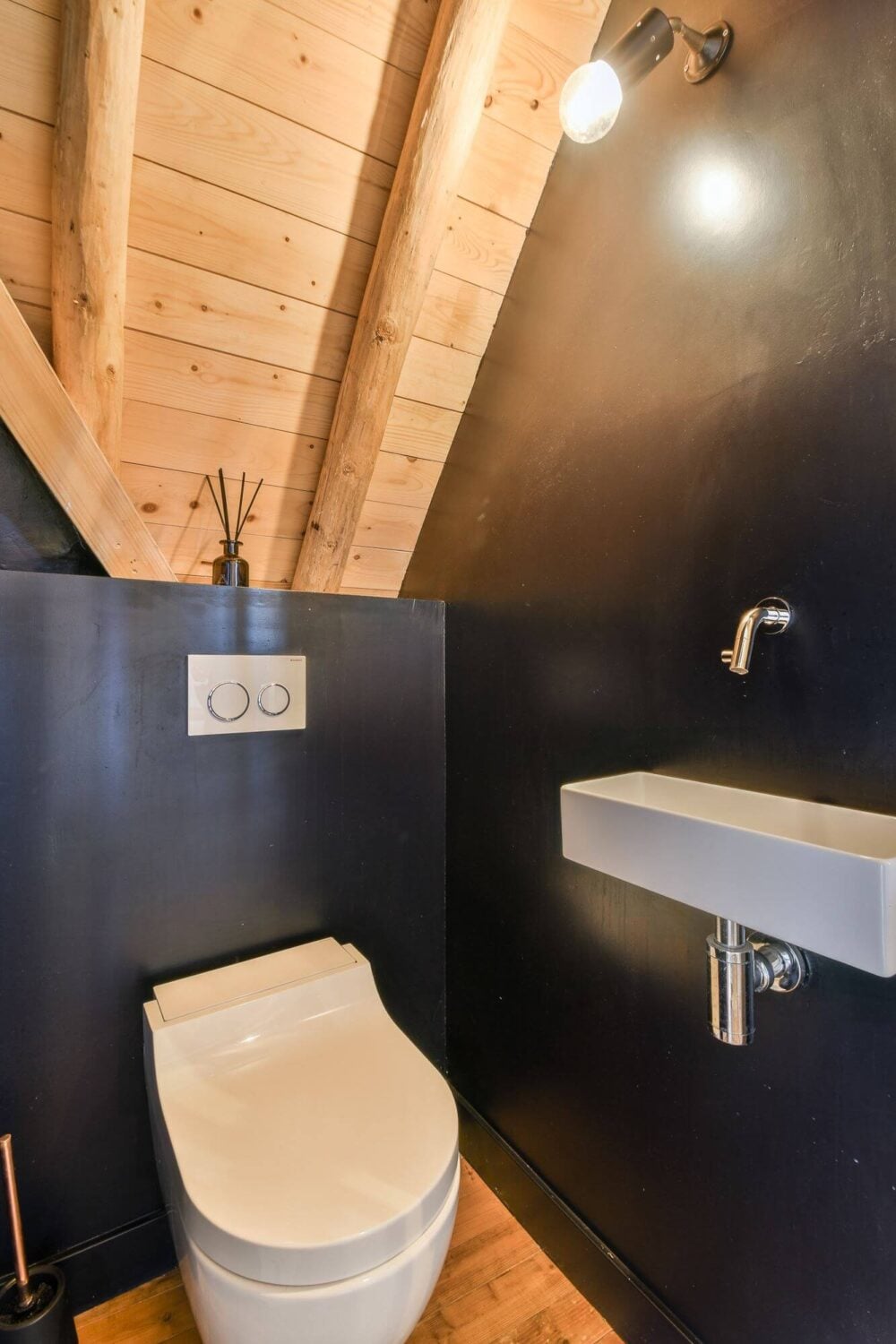 Wooden Interiors in a Historic Dutch Family Home 24 black-wood-toilet-nordroom
