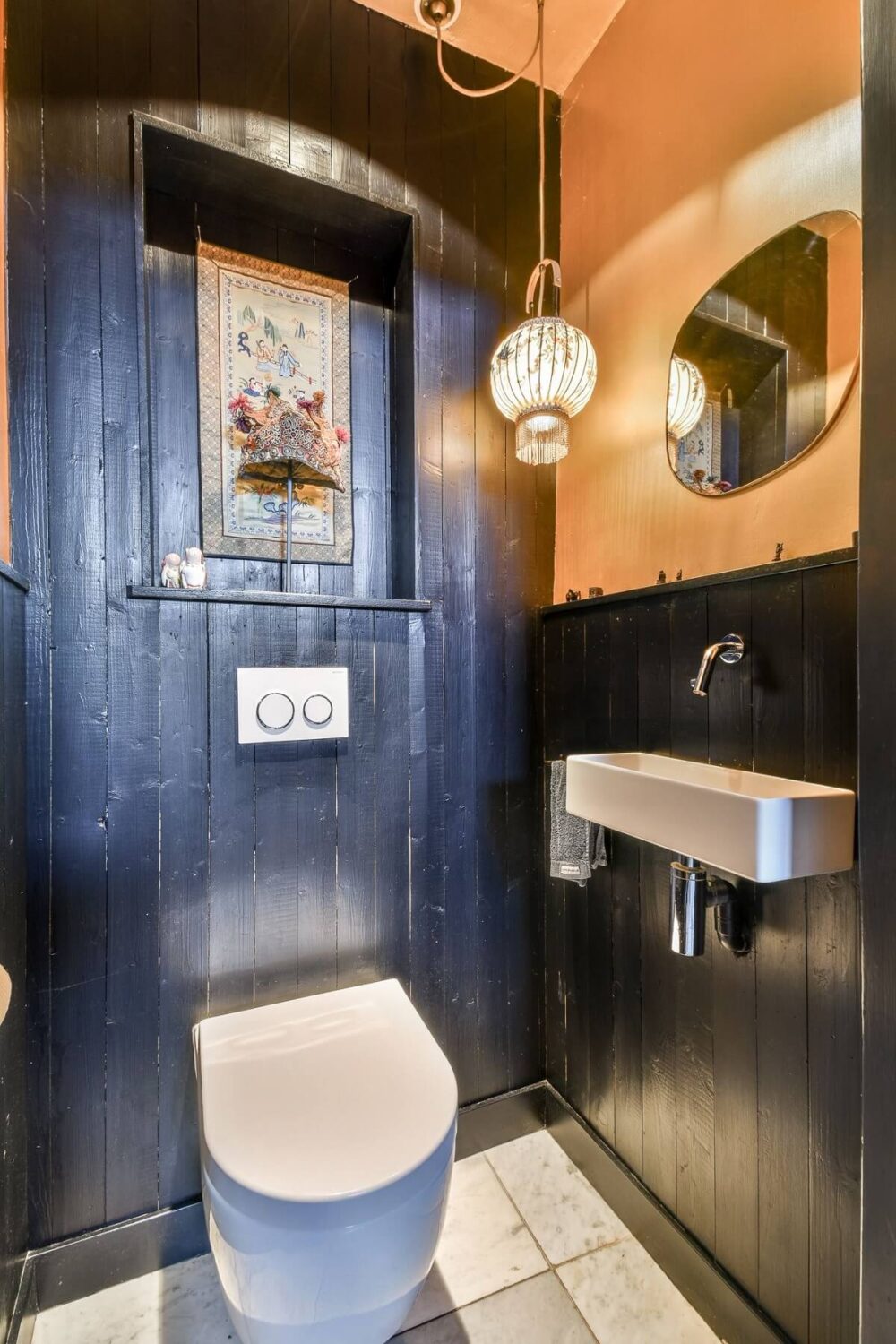 Wooden Interiors in a Historic Dutch Family Home 13 black-wooden-walls-powder-room-nordroom