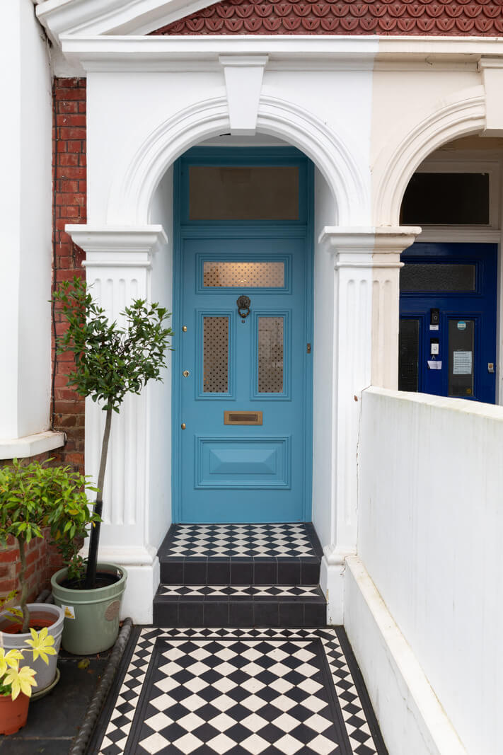 A Victorian House in London with Three Outdoor Spaces 13 blue front door