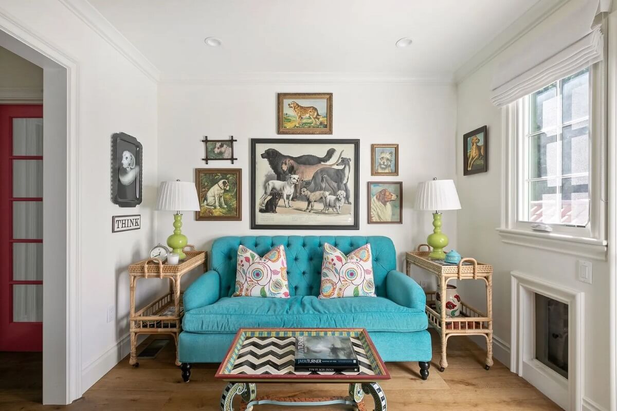 Emma Stone's Colorful Spanish-Style Los Angeles Home is For Sale 8 blue-sofa-gallery-wall-nordroom