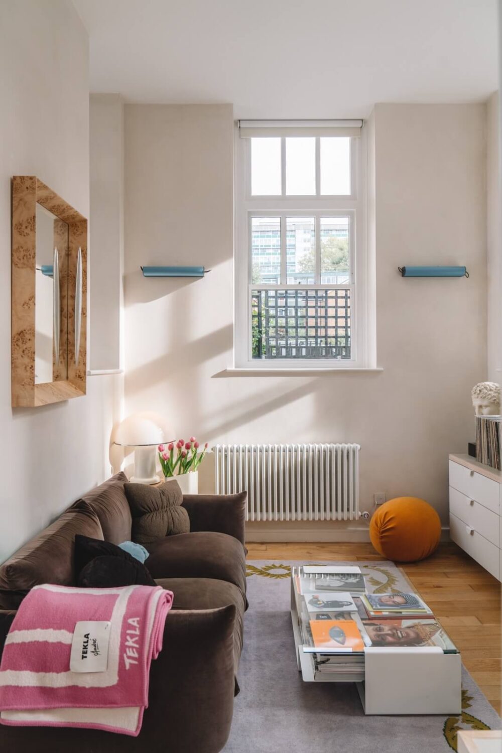 High Ceilings and Modern Design in a Light London Apartment 11 brown sofa light living room