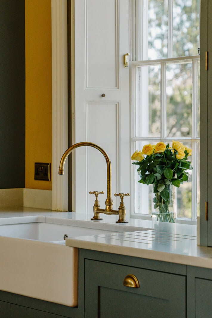 A Cozy Historic English Country House with Exposed Beams 4 butler sink brass fittings kitchen country house nordroom