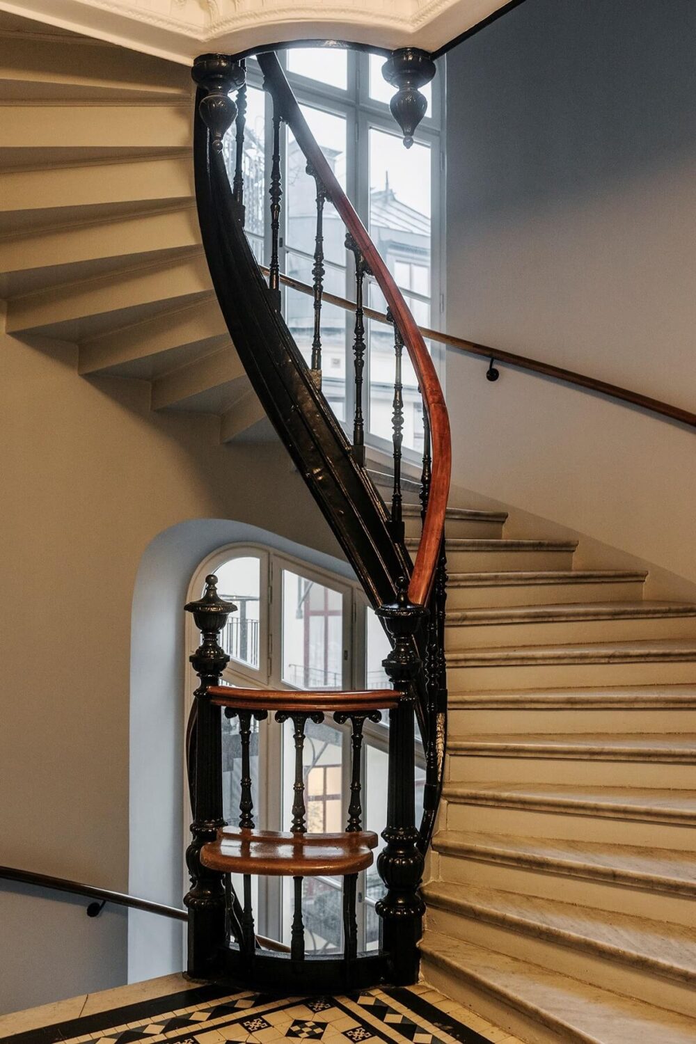 Stunning Fireplaces in a Historic Stockholm Apartment 26 central-spiral-staircase-apartment-stockholm-nordroom