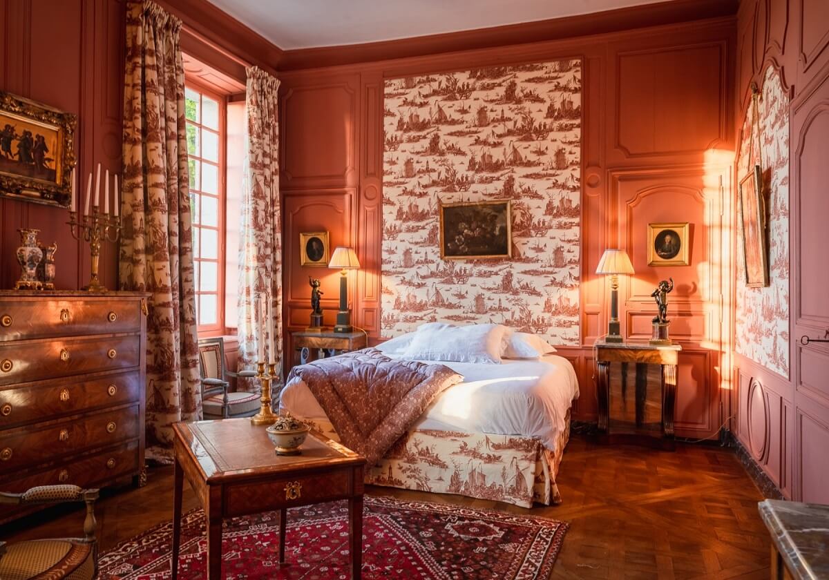 A Renovated 18th Century Chateau in France 13 chateau bedroom with terracotta wall paint nordroom