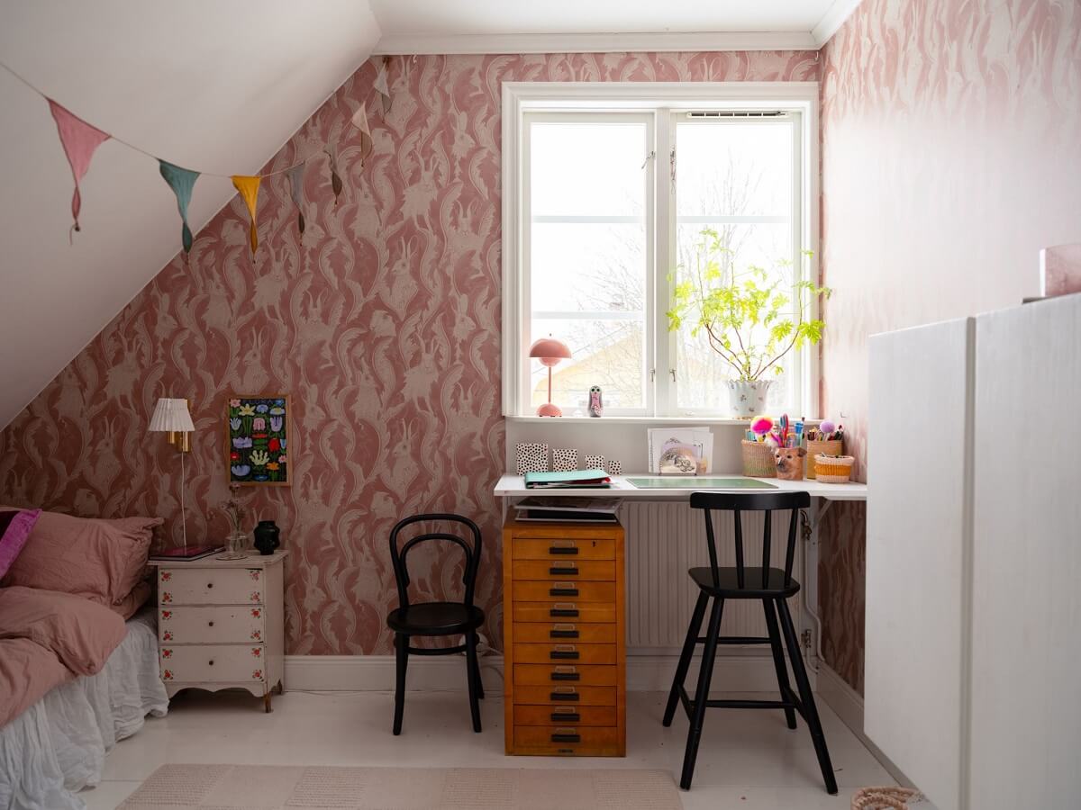 A Light Family Home in a Historic Yellow Villa 23 childrens room pink wallpaper desk nordroom