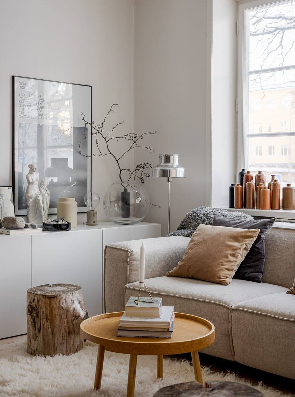A Light Apartment with a Stainless Steel Kitchen 2 detail scandinavian living room low white cabinets nordroom