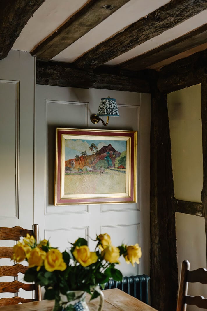 A Cozy Historic English Country House with Exposed Beams 13 dining room detail wooden beams