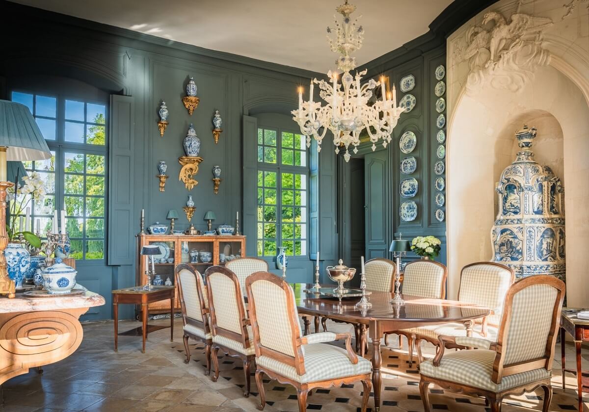 A Renovated 18th Century Chateau in France 7 dining room with sculpted stone eagle