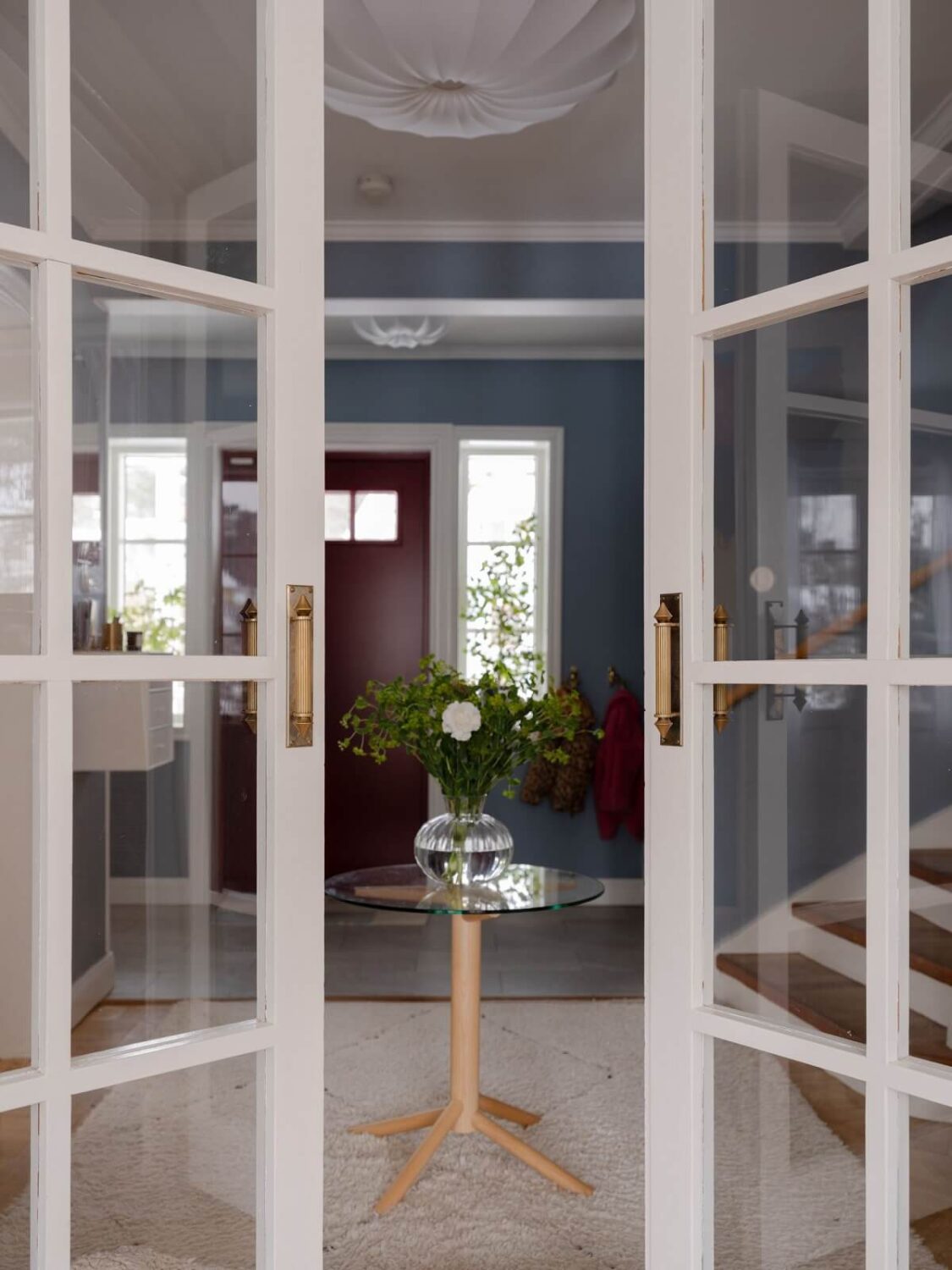 A Light Family Home in a Historic Yellow Villa 17 double glass doors hallway nordroom