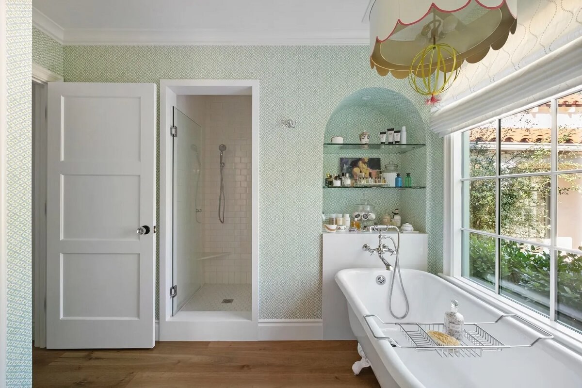 Emma Stone's Colorful Spanish-Style Los Angeles Home is For Sale 15 freestanding-bath-arched-storage-niche-green-wallpaper-nordroom