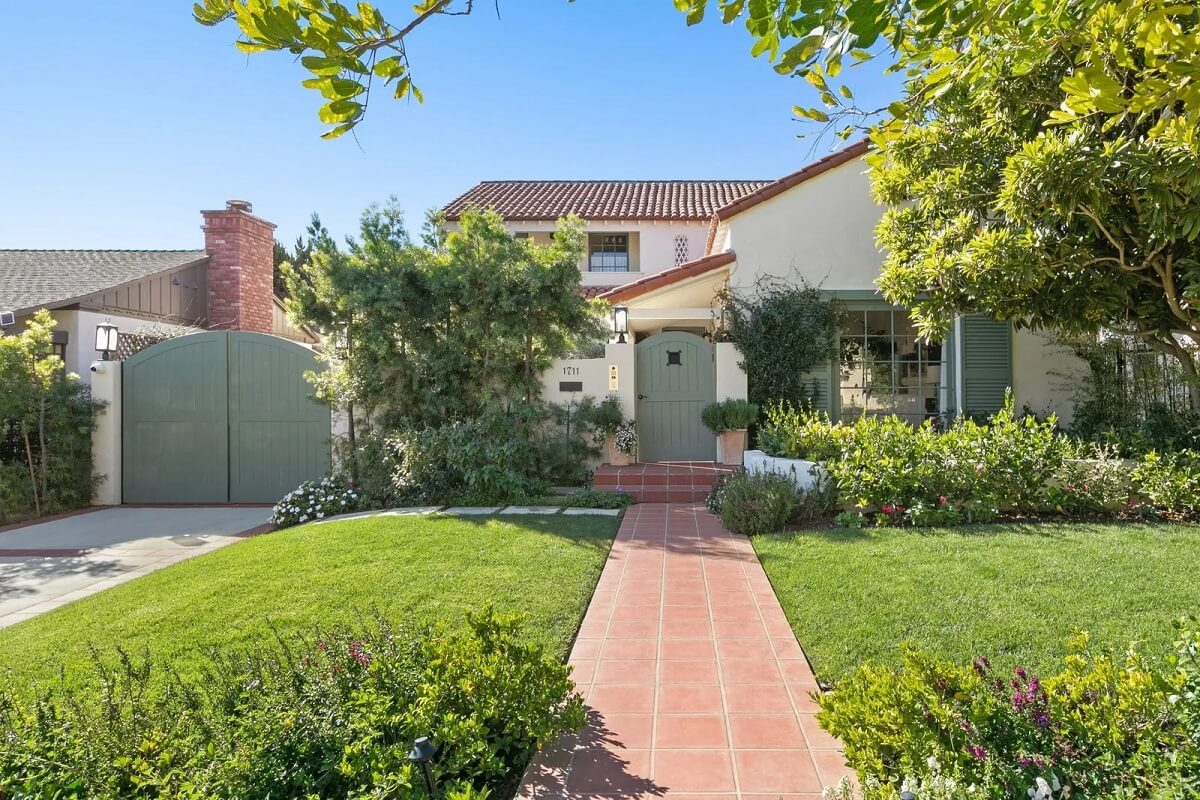 Emma Stone's Colorful Spanish-Style Los Angeles Home is For Sale 32 front-garden-sage-green-front-door-gate-emma-stone-spanish-style-home-los-angeles-nordroom