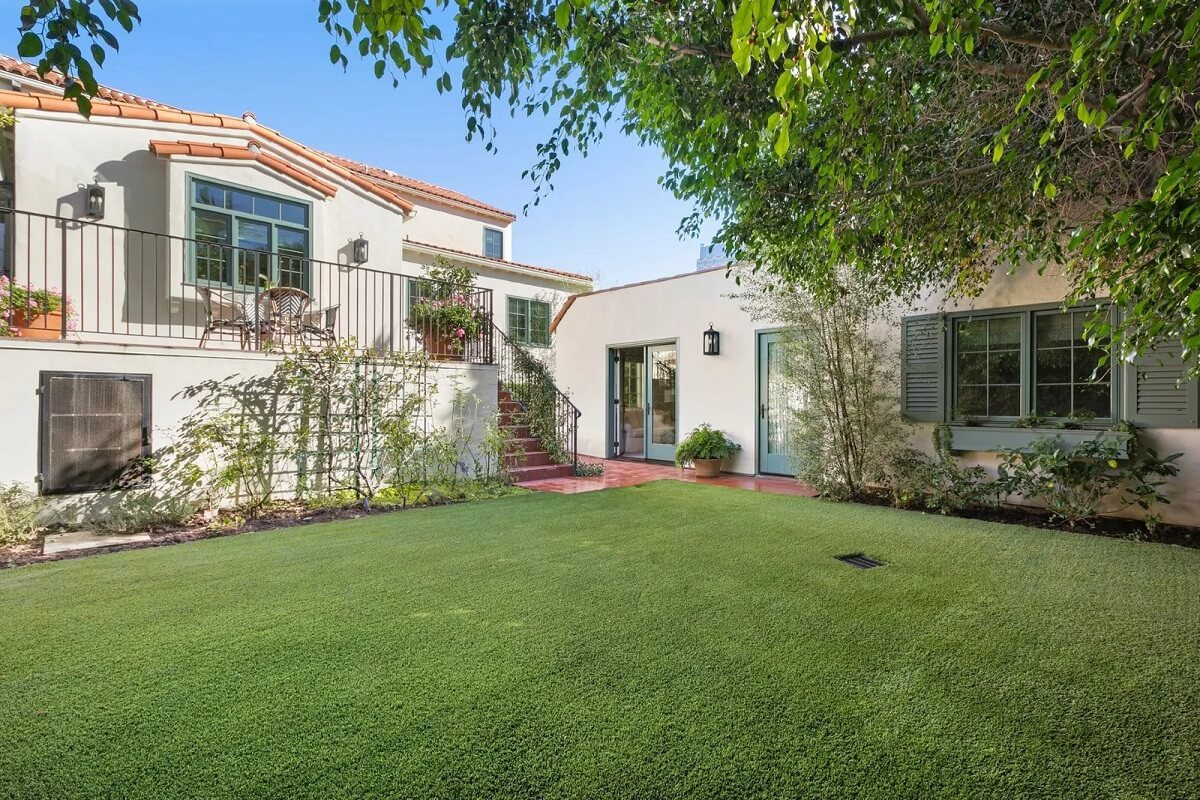 Emma Stone's Colorful Spanish-Style Los Angeles Home is For Sale 30 garden-spanish-style-home-emma-stone