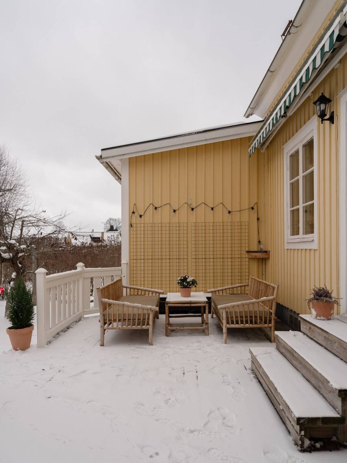 A Light Family Home in a Historic Yellow Villa 32 garden terrace yellow family home sweden nordroom