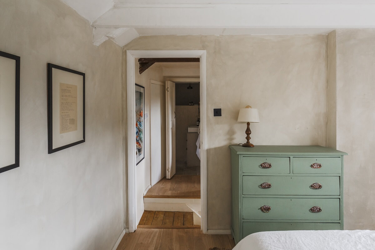 A Serene English Cottage in Cornwall 18 green-drawer-serene-bedroom