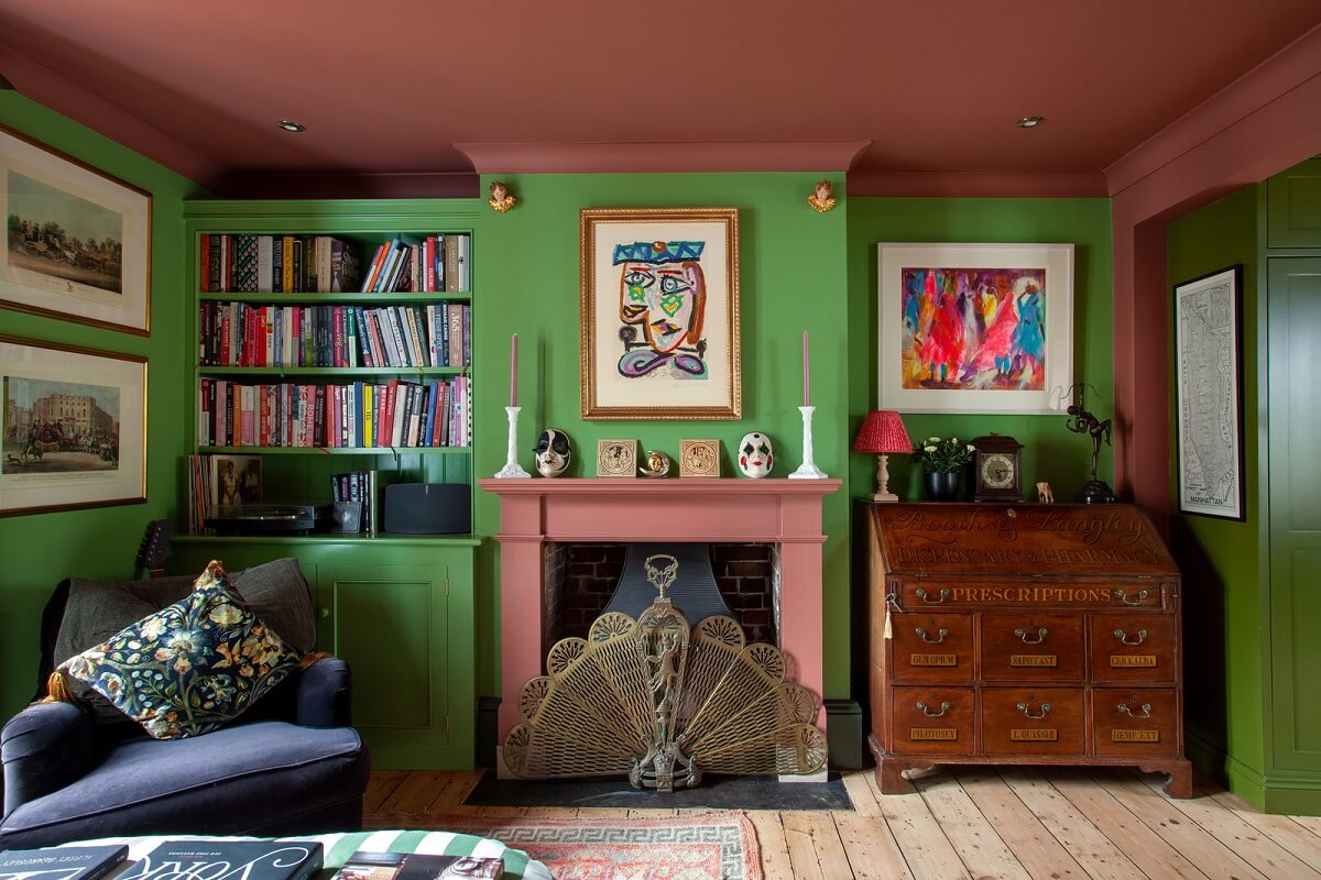 Bold Colors in a Charming Historic House in England 8 green-living-room-pink-ceiling-fireplace-nordroom