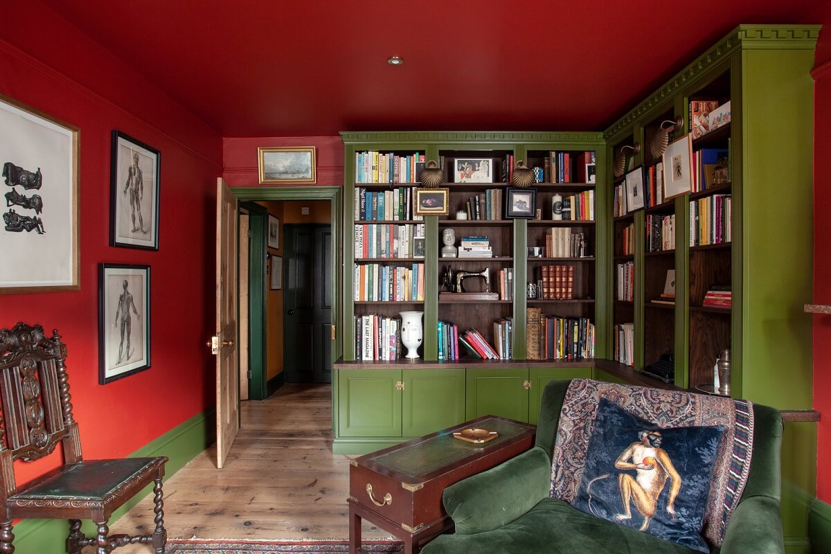 Bold Colors in a Charming Historic House in England 5 green-red-living-room-bookcases-nordroom