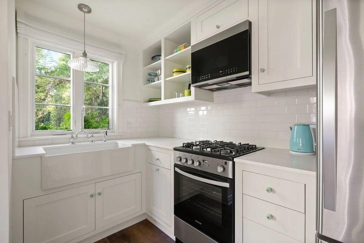 Emma Stone's Colorful Spanish-Style Los Angeles Home is For Sale 26 guest-house-kitchen-emma-stone-los-angeles-house-nordroom