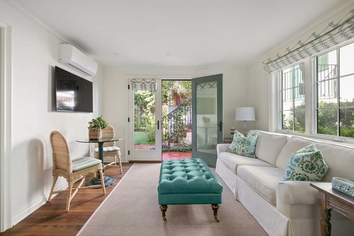 Emma Stone's Colorful Spanish-Style Los Angeles Home is For Sale 24 guest-house-living-room-emma-stone