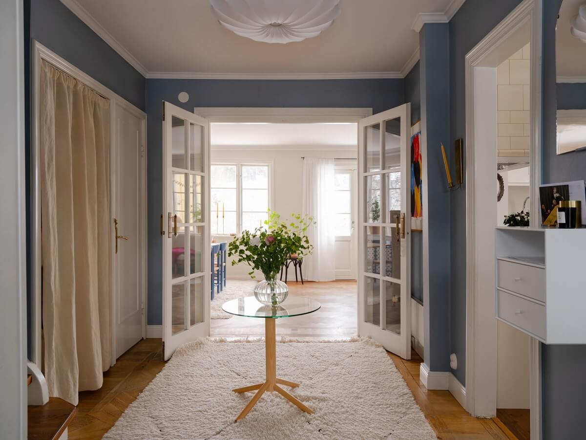 A Light Family Home in a Historic Yellow Villa 18 hallway with blue walls nordroom