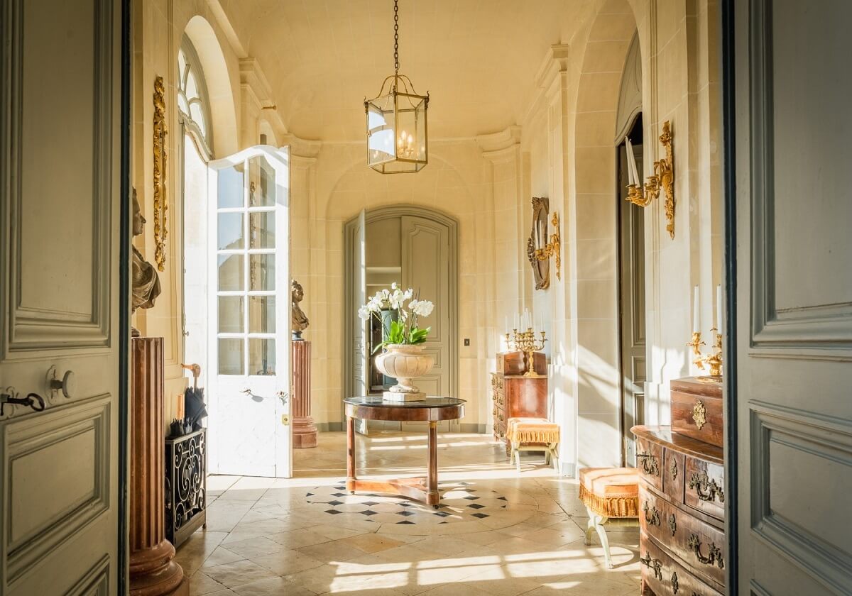 A Renovated 18th Century Chateau in France 9 hallway with sunlight renovated chateau france