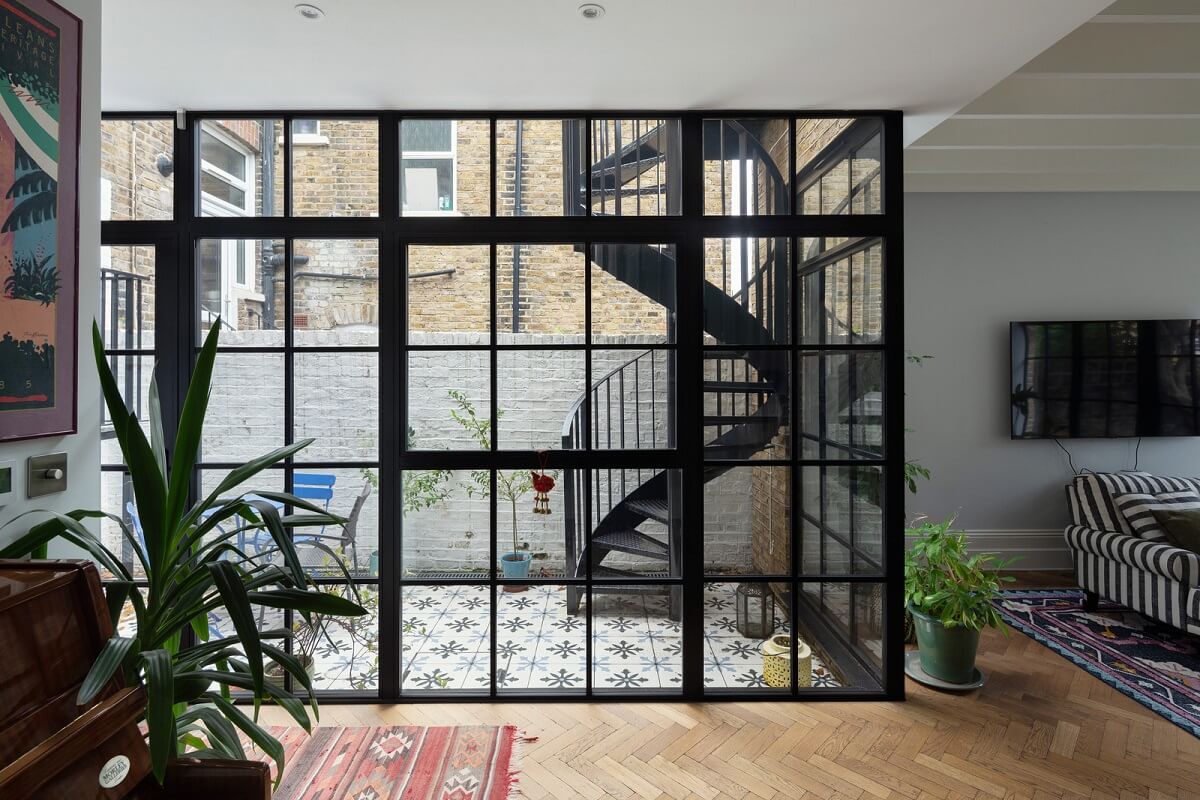 A Victorian House in London with Three Outdoor Spaces 9 industrial style windows patio