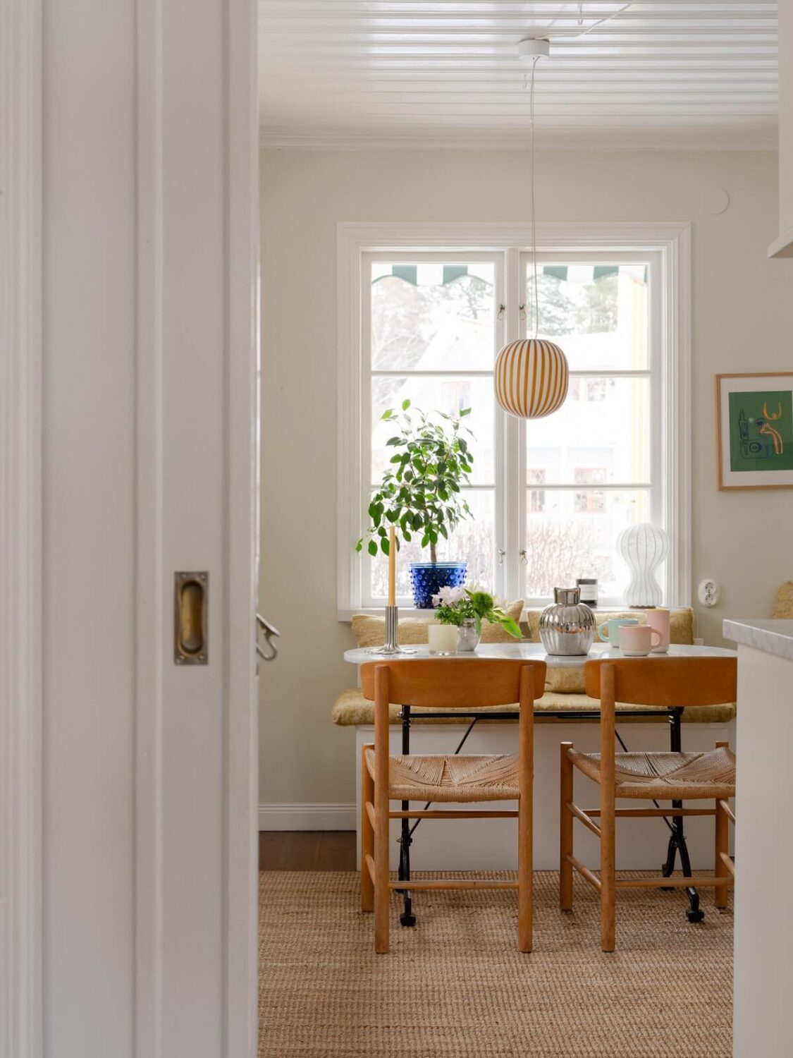 A Light Family Home in a Historic Yellow Villa 16 kitchen dining table with bench nordroom