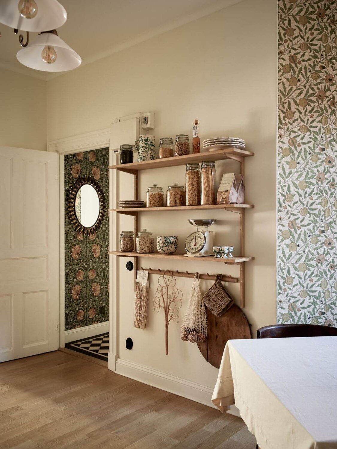 William Morris Wallpaper in a Scandinavian Apartment 13 kitchen wooden shelves