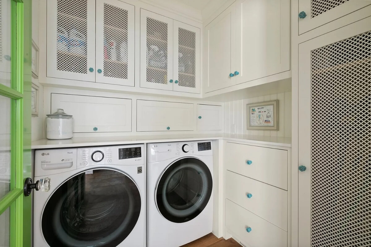 Emma Stone's Colorful Spanish-Style Los Angeles Home is For Sale 20 laundry-room